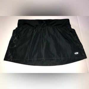 Champion 
Black Skort/Bikini Bottom
Size Medium 
New Never Worn